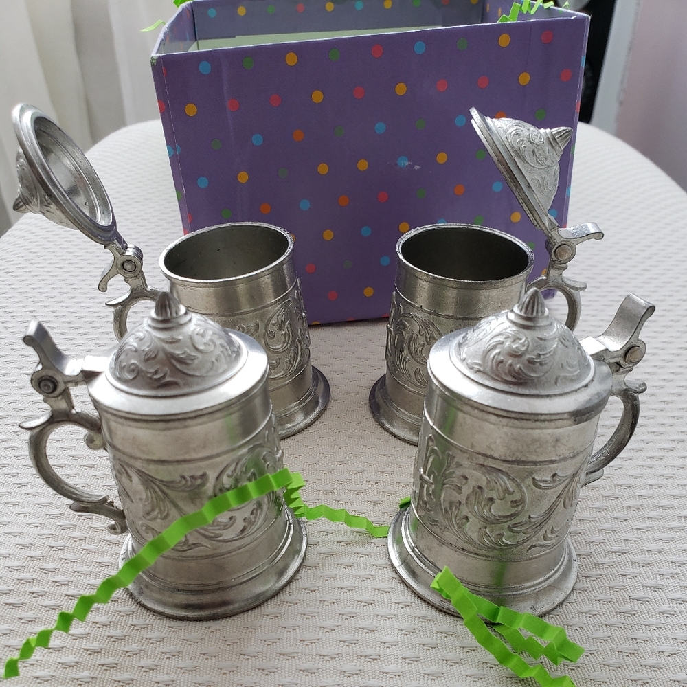Set of Four Pewter German Beer Steins